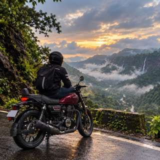 Road Sailor — rider overlooking misty ghats